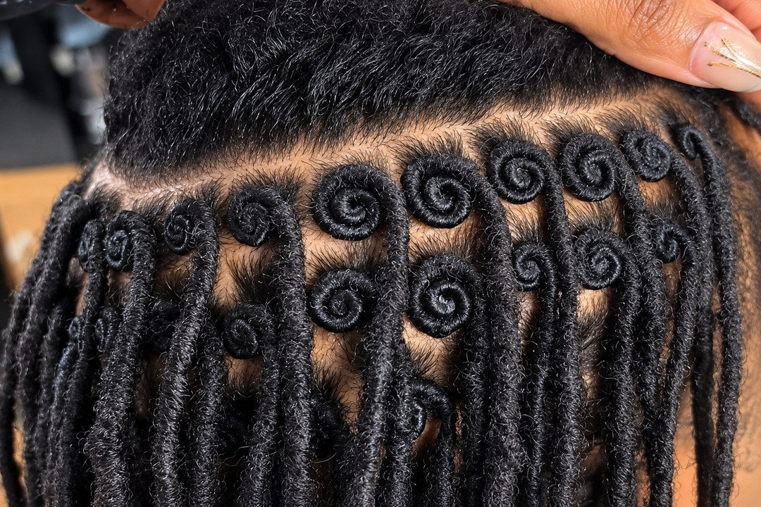 Comb retwist in progress at Locs of Love